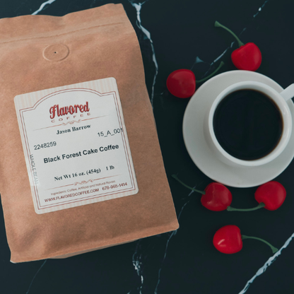 Flavored Coffee package with a cup of coffee and cherries on a dark surface