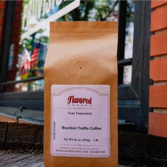 Coffee bag with a label on a wooden surface outdoors
