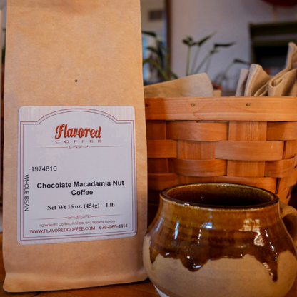 Bag of Flavored Coffee with a label, next to a ceramic mug and a woven basket.