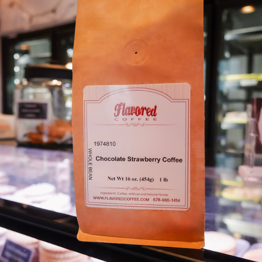 Bag of Flavored Coffee with a label on a blurred background