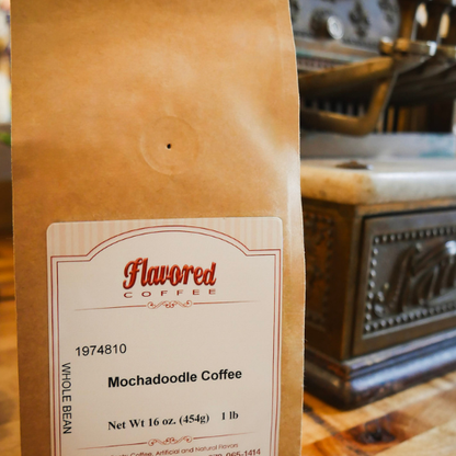 Bag of Flavored Coffee with a label on a wooden surface
