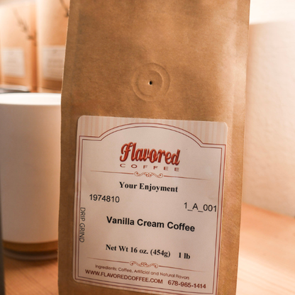 Kraft paper bag of vanilla cream coffee with a label on a wooden surface.
