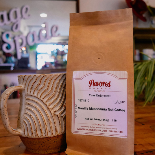 Flavored coffee package with a ceramic mug on a wooden surface