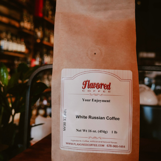 Bag of Flavored Coffee with a label on a blurred bar background