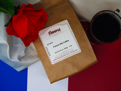 Kraft paper coffee bag with a label, red rose, and coffee cup on a white and red background