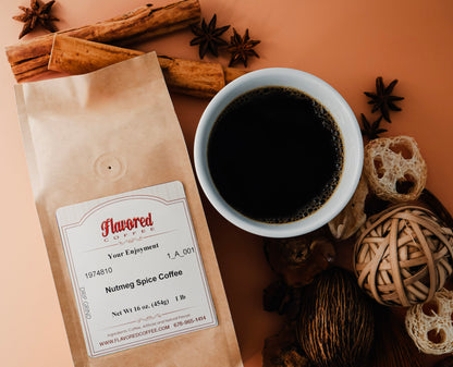 Nutmeg spice coffee package with a cup of coffee and spices on a peach background